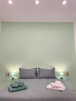 Letto o letti in una camera di B&B Dimora Cortese