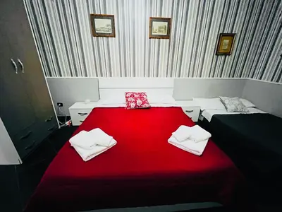 Letto o letti in una camera di Tarsia Suite