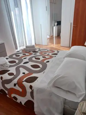 Letto o letti in una camera di Casa Chiara