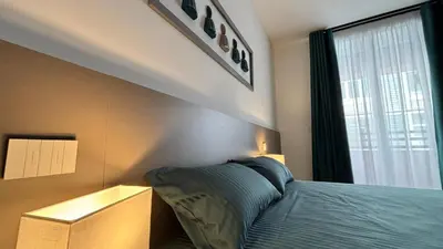 Letto o letti in una camera di Seaside Suites
