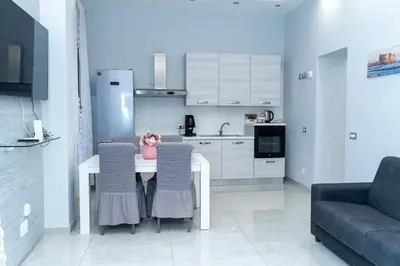 Cucina o angolo cottura di PORTACAPUANA Guest House
