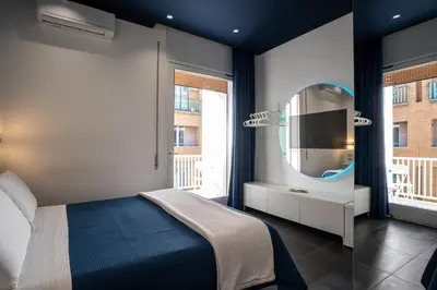 Letto o letti in una camera di Skyhouse Beverello