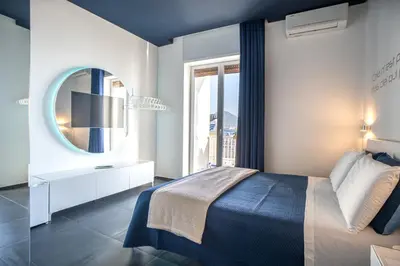 Letto o letti in una camera di Skyhouse Beverello
