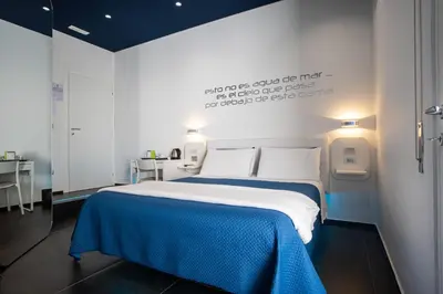 Letto o letti in una camera di Skyhouse Beverello