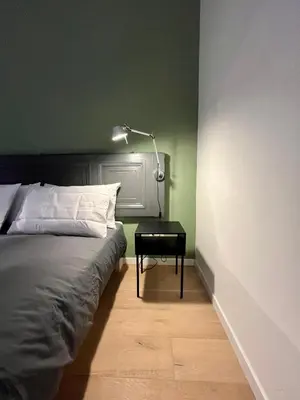 Letto o letti in una camera di Concrete Apartment Museo