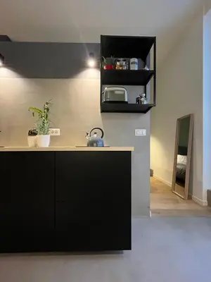 Cucina o angolo cottura di Concrete Apartment Museo