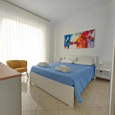 Letto o letti in una camera di San Pasquale Home