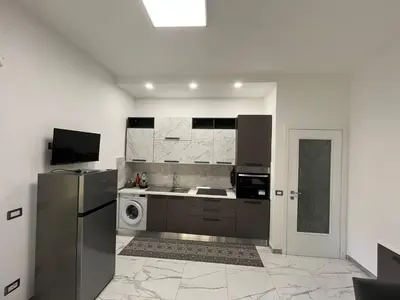 Cucina o angolo cottura di Carelli 9 Apartments 4