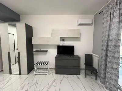 TV o dispositivi per l'intrattenimento presso Carelli 9 Apartments 4