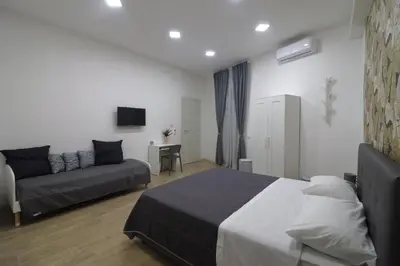 Letto o letti in una camera di Casa Magi