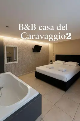 Letto o letti in una camera di Casa del caravaggio 2