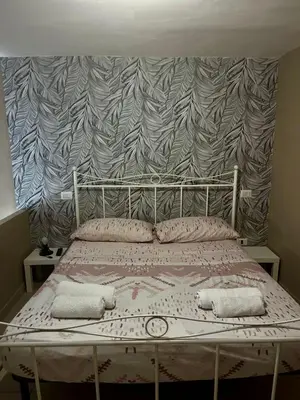 Letto o letti in una camera di Casa del caravaggio 2