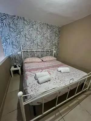 Letto o letti in una camera di Casa del caravaggio 2