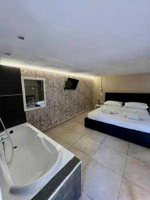 Letto o letti in una camera di Casa del caravaggio 2