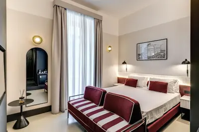 Letto o letti in una camera di Adaram Suites