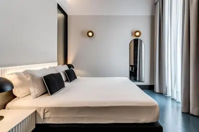 Letto o letti in una camera di Adaram Suites