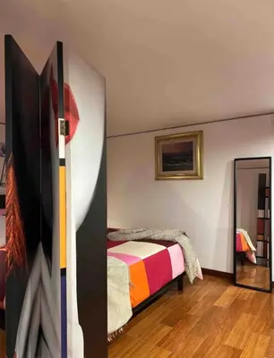 Letto o letti in una camera di Ann' Amarì Amaranto