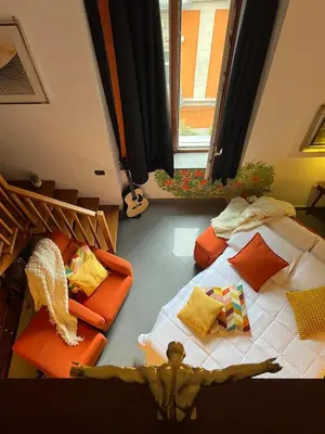 Letto o letti in una camera di Ann' Amarì Arancione