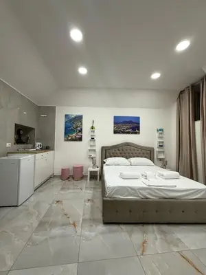 Letto o letti in una camera di Valentino Suite 36