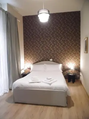 Letto o letti in una camera di The Double Charme