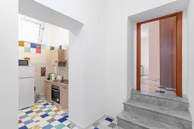 Cucina o angolo cottura di Appartamenti La Dimora di Parthenope Centro Storico