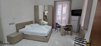 Letto o letti in una camera di Appartamenti La Dimora di Parthenope Centro Storico