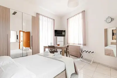 Letto o letti in una camera di Appartamenti La Dimora di Parthenope Centro Storico