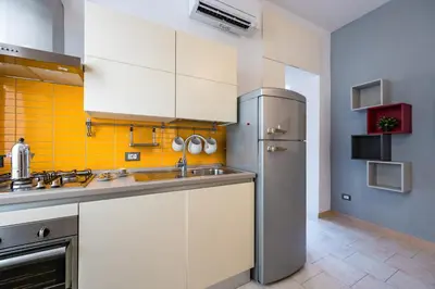 Cucina o angolo cottura di Metro Università Apartment by Wonderful Italy