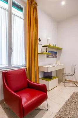 Area soggiorno di Metro Università Apartment by Wonderful Italy