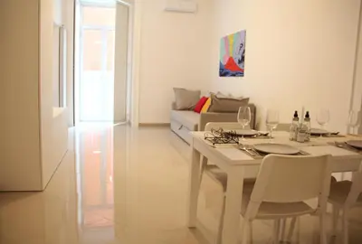 Area soggiorno di Giuma House