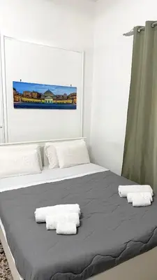 Letto o letti in una camera di House Corso Umberto Rooms & Comfort by Loveinthetravel