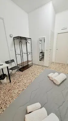Letto o letti in una camera di House Corso Umberto Rooms & Comfort by Loveinthetravel