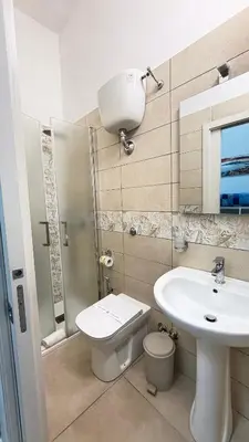 Bagno di House Corso Umberto Rooms & Comfort by Loveinthetravel
