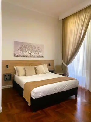 Letto o letti in una camera di AR b&b Nel Cuore di Napoli