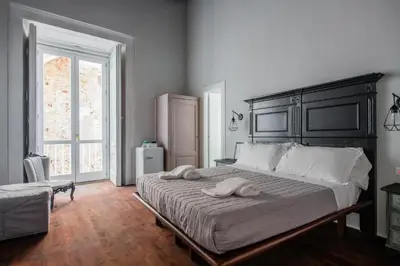Letto o letti in una camera di Carafa Palace By Dimorra