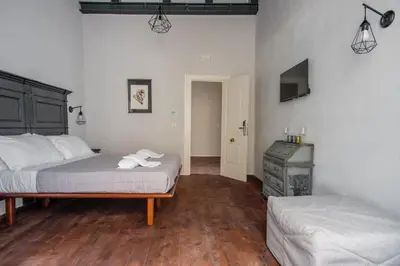 Letto o letti in una camera di Carafa Palace By Dimorra