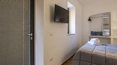 Letto o letti in una camera di Palazzo Mormando - Mini Apartment