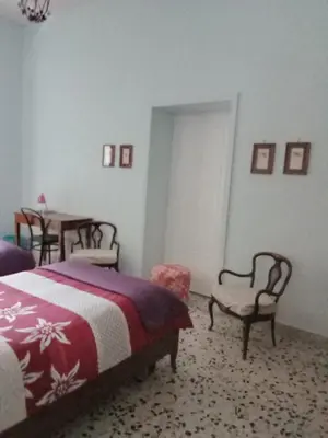Letto o letti in una camera di NAPOLI CENTRAL CiTY