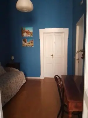Letto o letti in una camera di NAPOLI CENTRAL CiTY