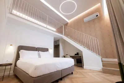 Letto o letti in una camera di Casa D Hotel Napoli