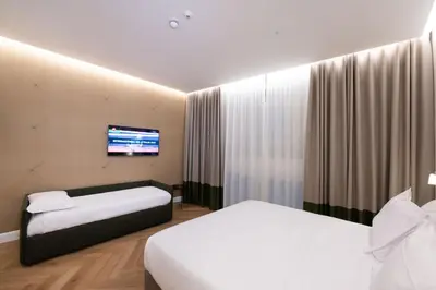 Letto o letti in una camera di Casa D Hotel Napoli