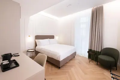 Letto o letti in una camera di Casa D Hotel Napoli