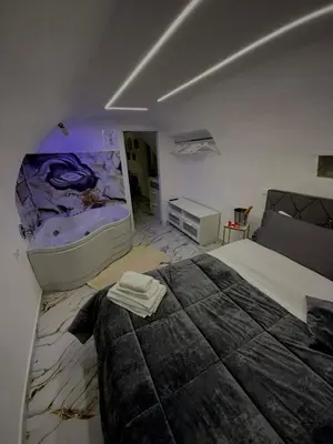 Letto o letti in una camera di Suite Sanità
