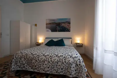 Letto o letti in una camera di Resta Cu'mme Vomero
