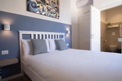 Letto o letti in una camera di Decumano 43 Rooms