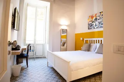 Letto o letti in una camera di Decumano 43 Rooms