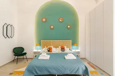 Letto o letti in una camera di Casa FeFe Napoli