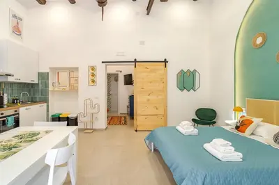 Letto o letti in una camera di Casa FeFe Napoli