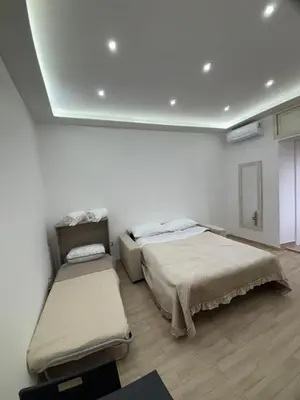 Letto o letti in una camera di House Carmen Naples