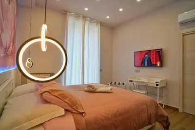 Letto o letti in una camera di Peonia Rooms